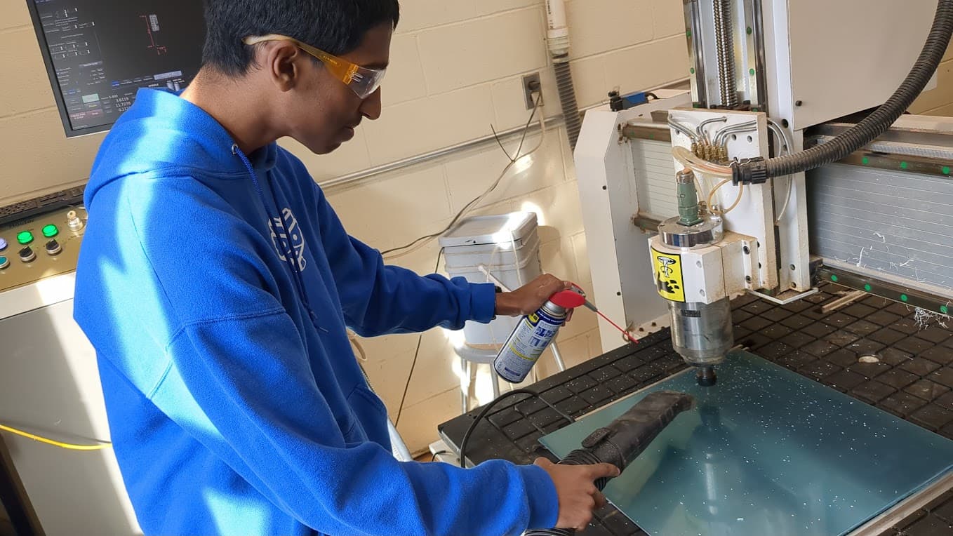 Nash blowing off the dust from the chassis.