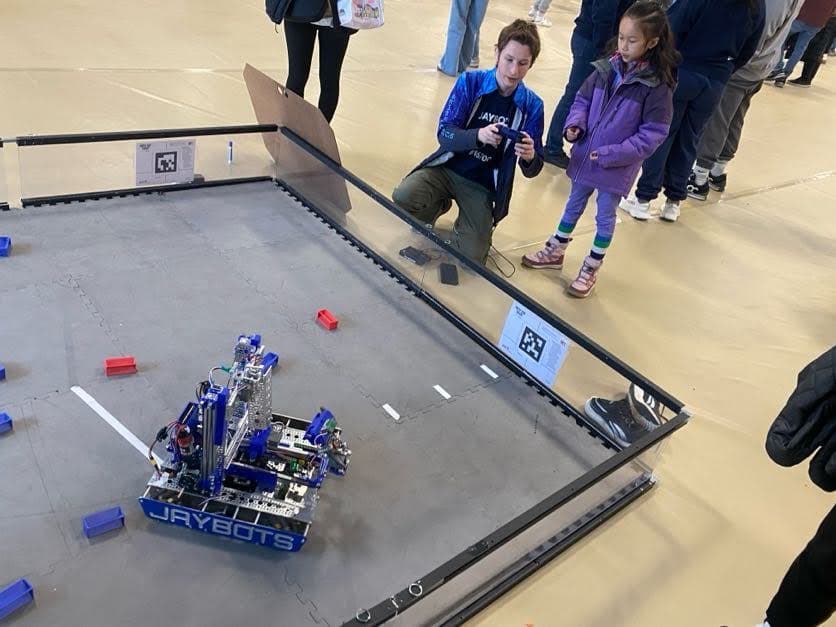 Matt & Ant fixing 3D printer at a middle school