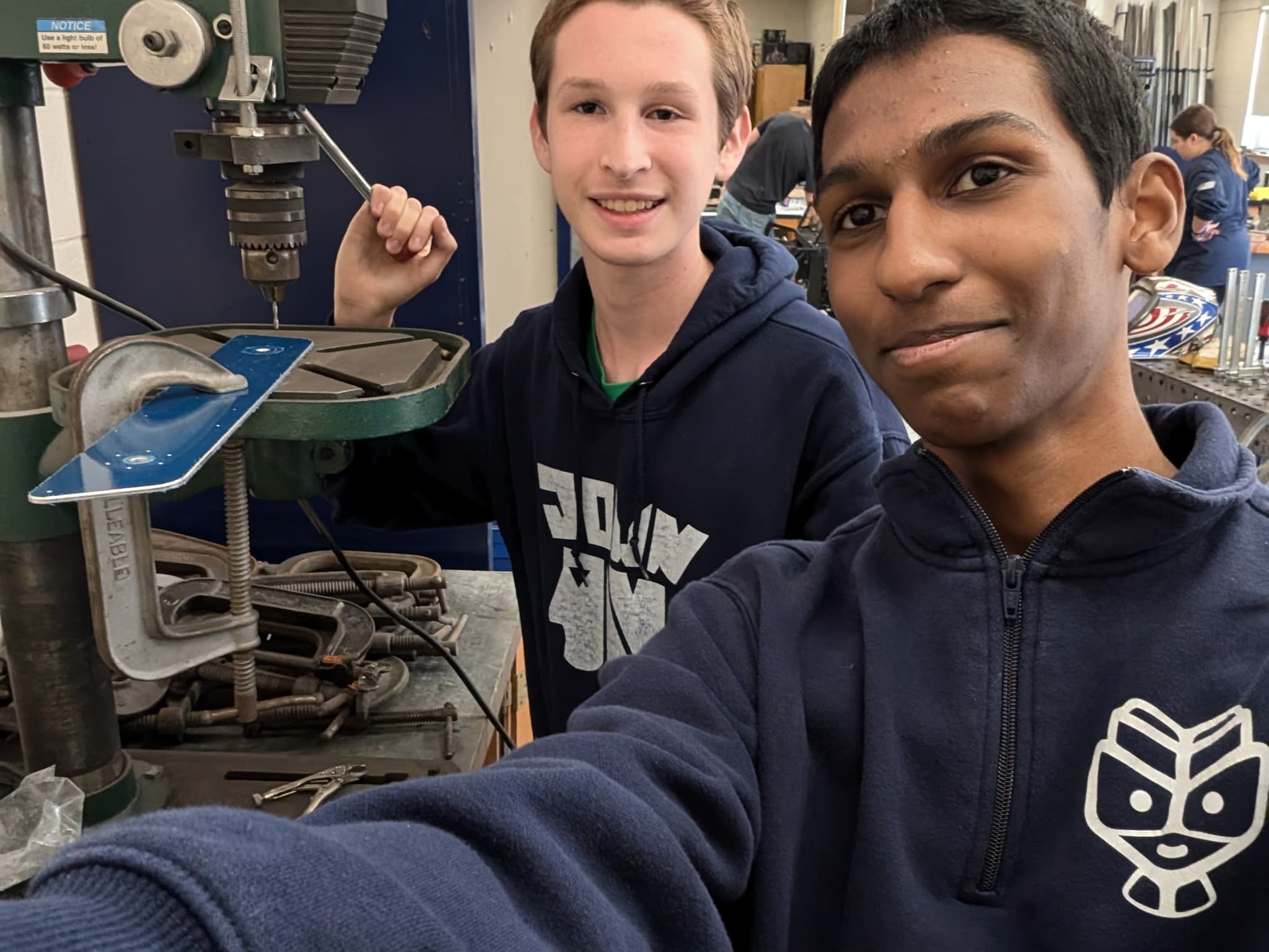 Matt & Nash using drill press for Custom Chassis