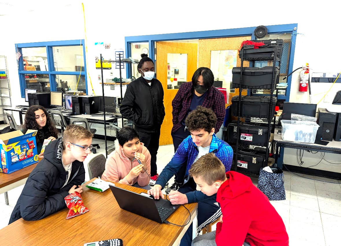 Jason showing students a vieo