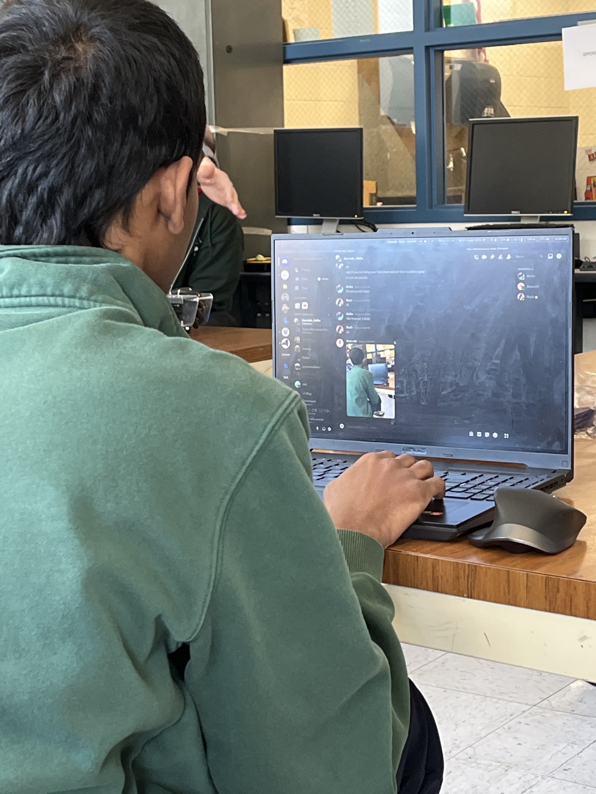 Nash looking at a picture of himself