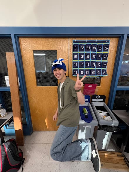 The "pumpkinator" posing with his new jaybot hat